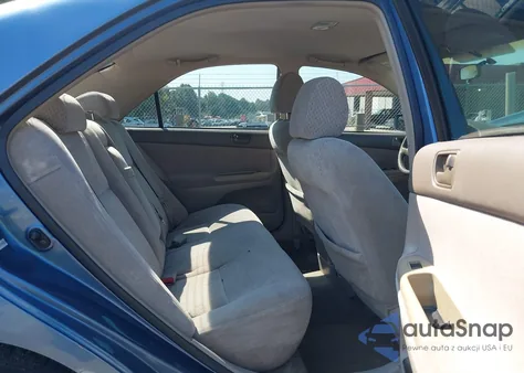 2003 Toyota Camry Le z USA, uszkodzony, nr VIN 4T1BE32K73U660930